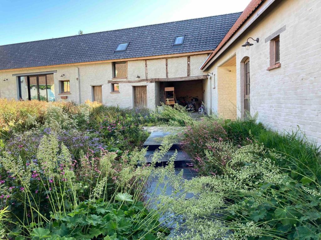 Zahrada ubytování Nachtegael Hoekhuis, knusse woning met prachtig vergezicht