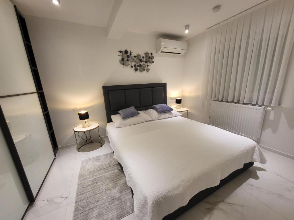 Posteľ alebo postele v izbe v ubytovaní The View Residence