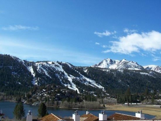 a view of a mountain range with snow covered mountains at Rr-interlaken 05 in June Lake