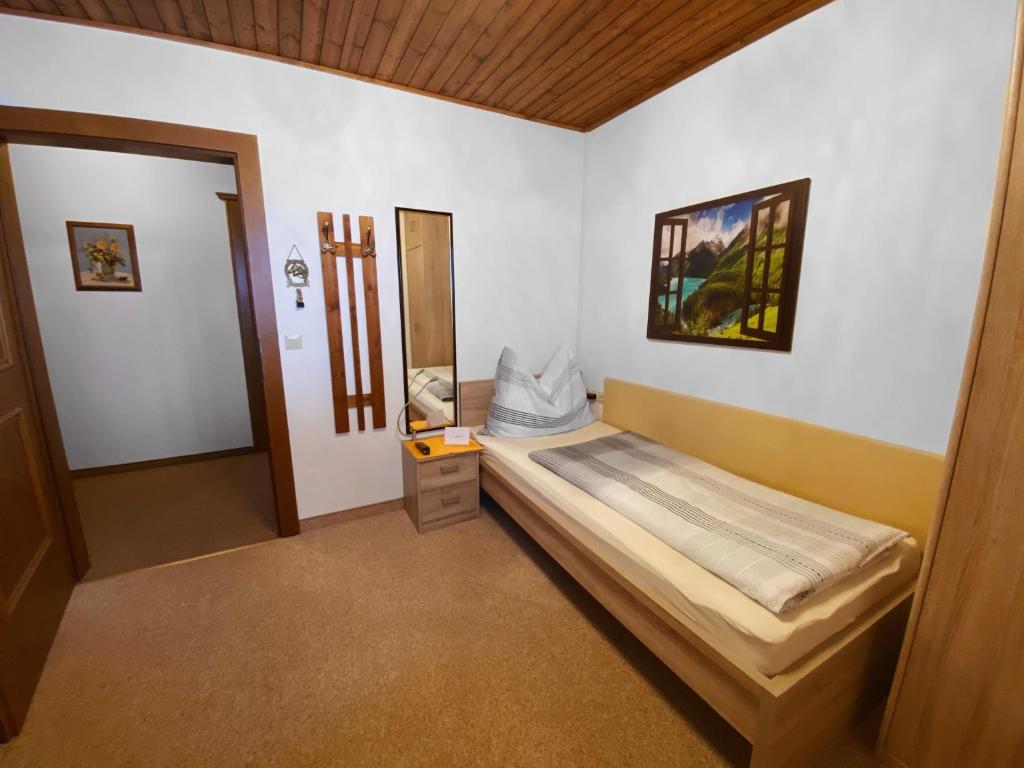 Postel nebo postele na pokoji v ubytování Haus Ratgeb