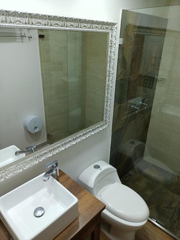 Koupelna v ubytování Hotel Poma Rosa