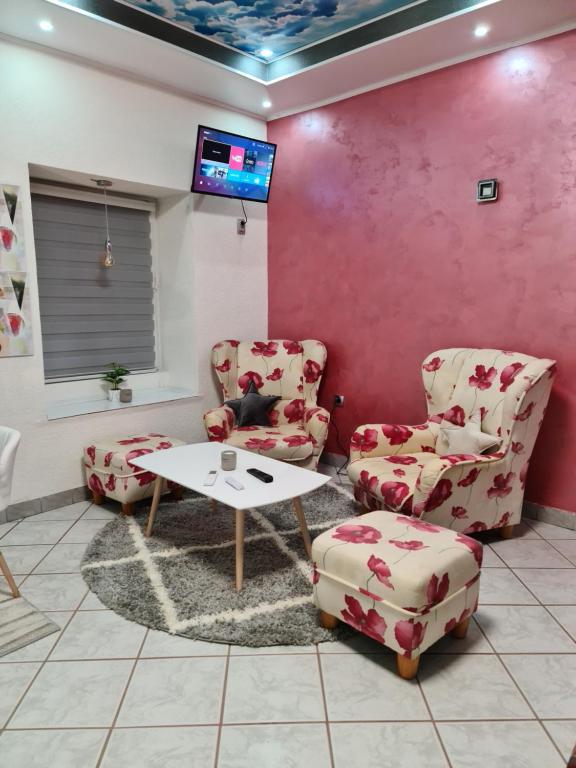 Posezení v ubytování Apartman -HARMONY-