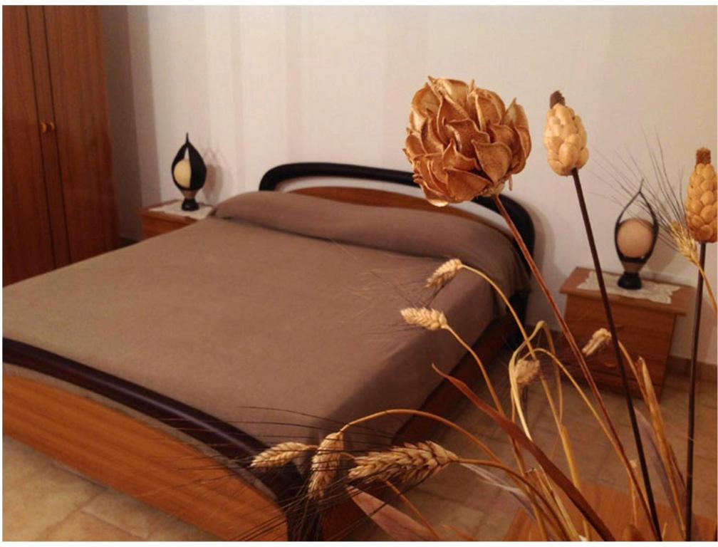 Letto o letti in una camera di B&B Via dei Trulli