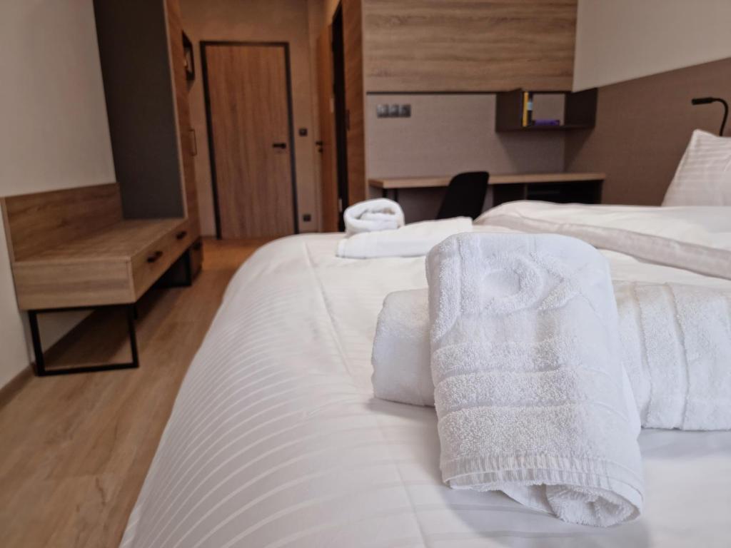 Postel nebo postele na pokoji v ubytování JBX Resort Avenue Lipno