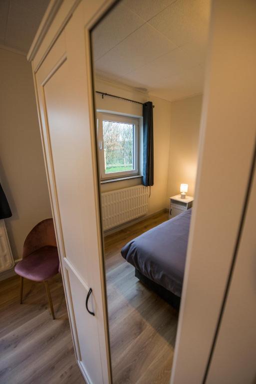 Postel nebo postele na pokoji v ubytování Agimon'TOIT