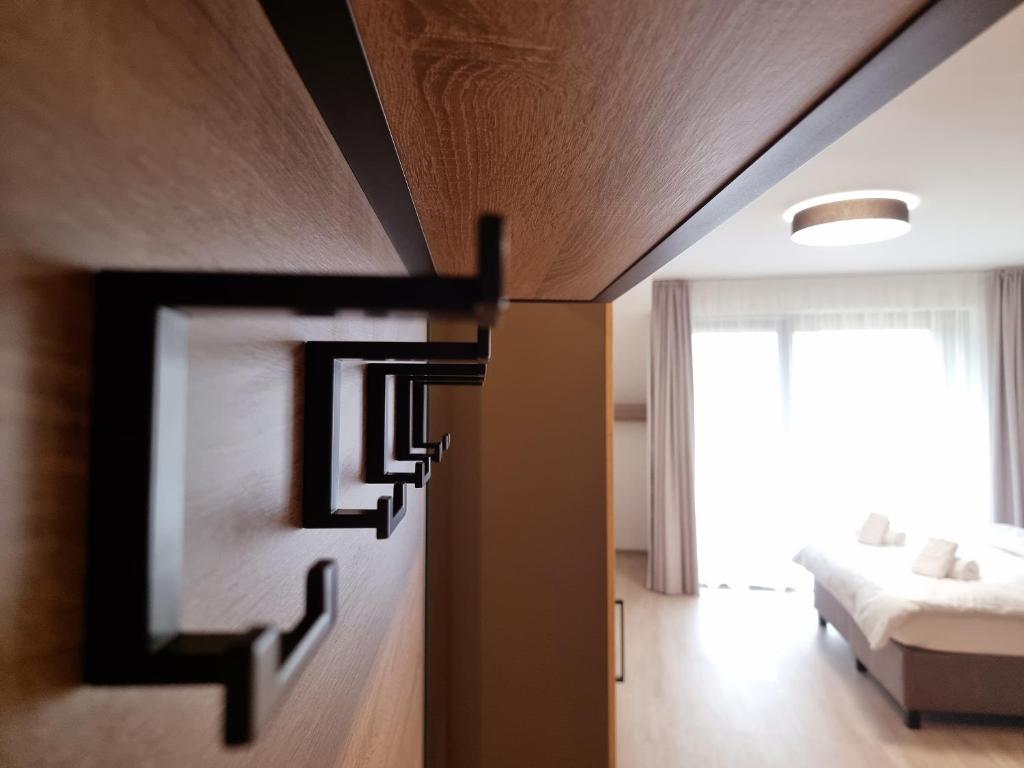 Postel nebo postele na pokoji v ubytování JBX Resort Avenue Lipno