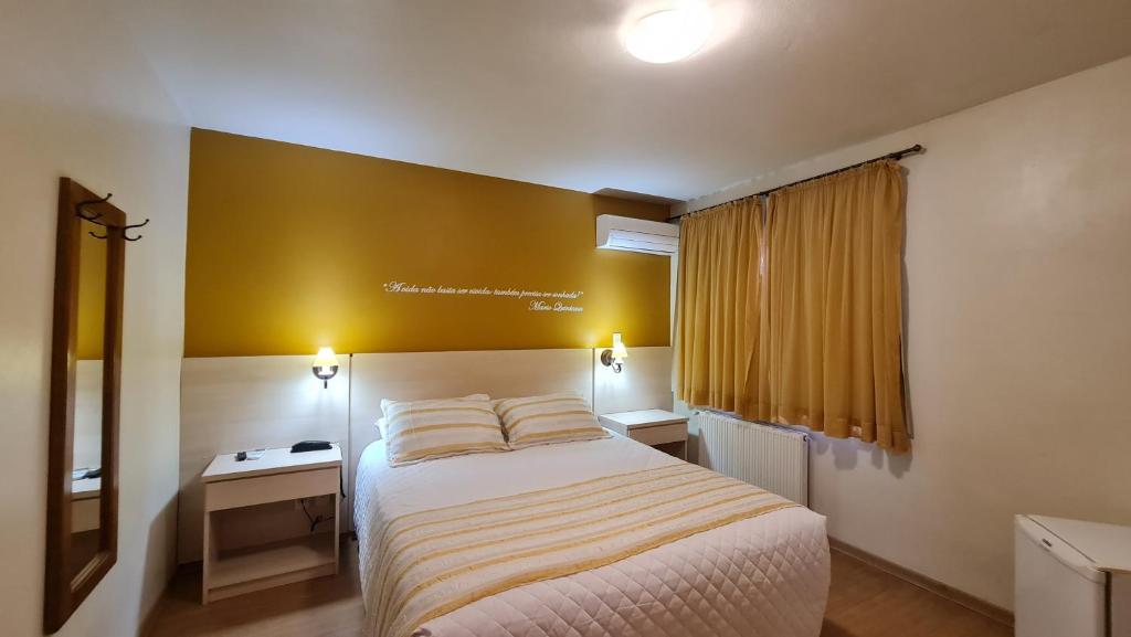 Postel nebo postele na pokoji v ubytování Pousada Pinhão e Poesia