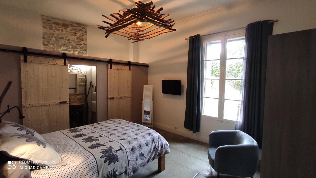 Cama o camas de una habitación en La Vigneronne des Costières