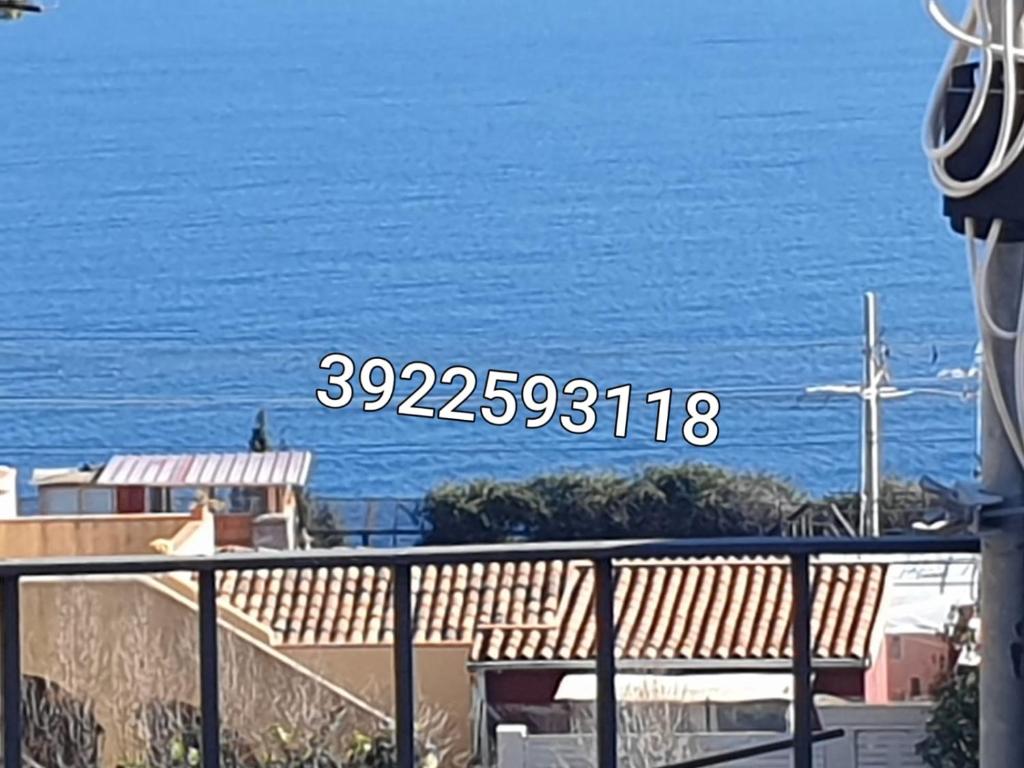 a view of the ocean from a balcony at Bellavista in Acireale