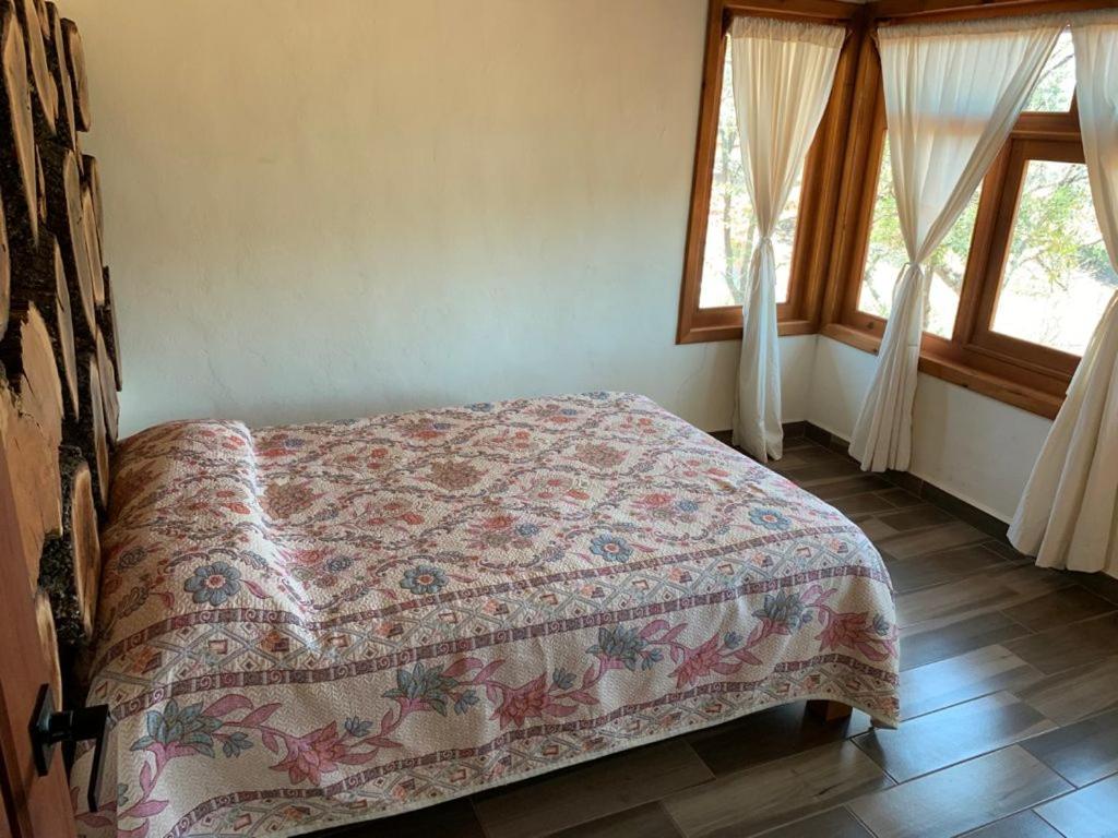 Postel nebo postele na pokoji v ubytování Cabaña Verito