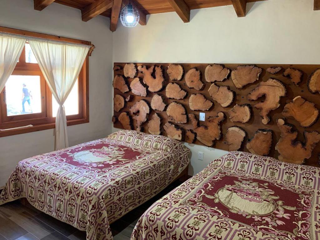 Postel nebo postele na pokoji v ubytování Cabaña Verito