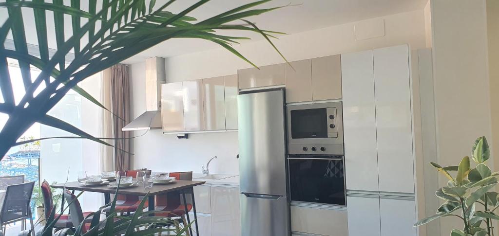 Kuchyňa alebo kuchynka v ubytovaní HD Mogán Canal Apartments
