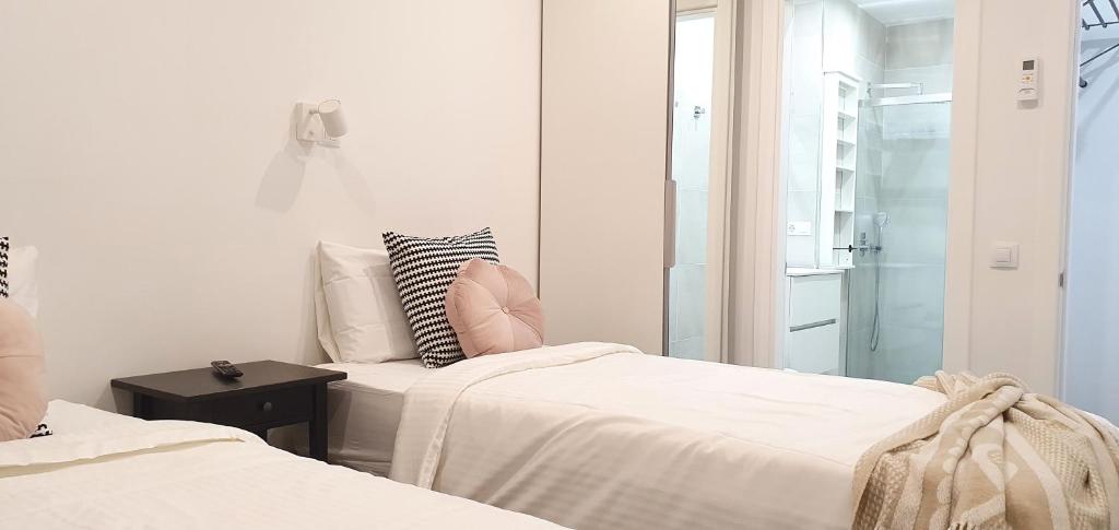 Posteľ alebo postele v izbe v ubytovaní HD Mogán Canal Apartments