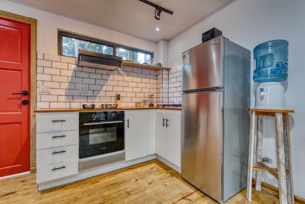 Kuchyň nebo kuchyňský kout v ubytování MALU Cabins