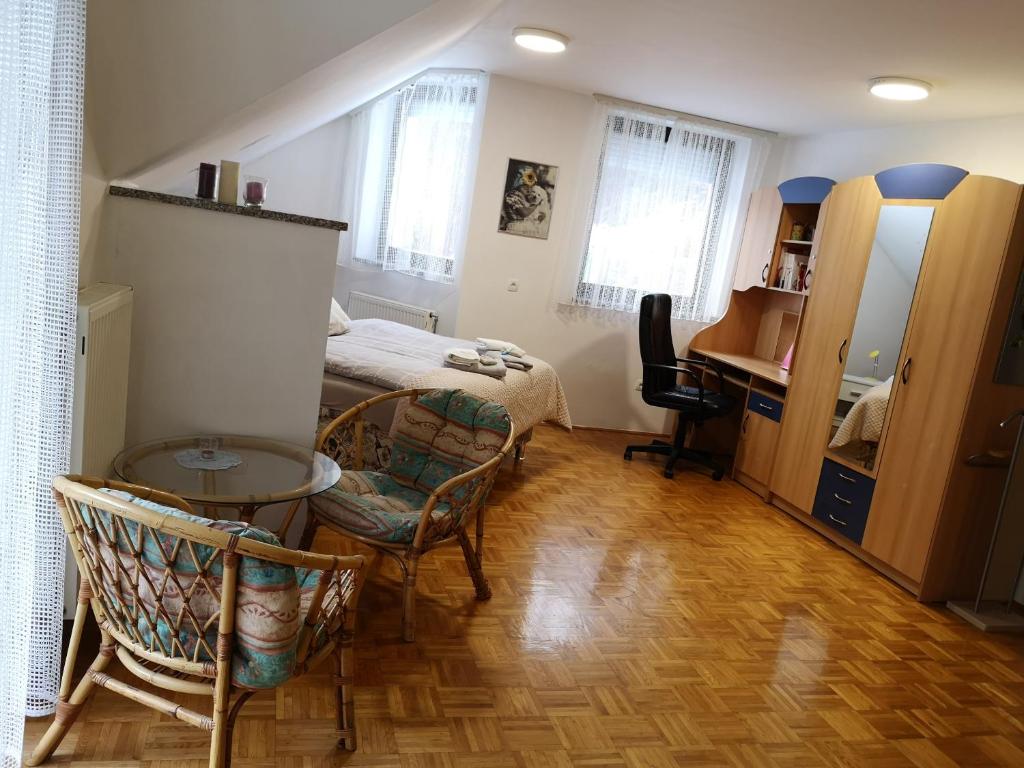 Postel nebo postele na pokoji v ubytování Apartma Juteršek