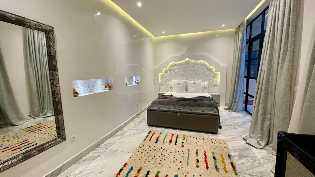 Postel nebo postele na pokoji v ubytování RIAD NOLITA & SPA Kasbah