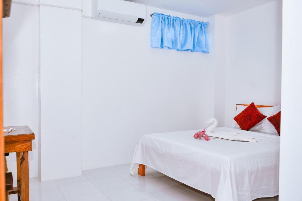 Postel nebo postele na pokoji v ubytování Hotel Don Raul