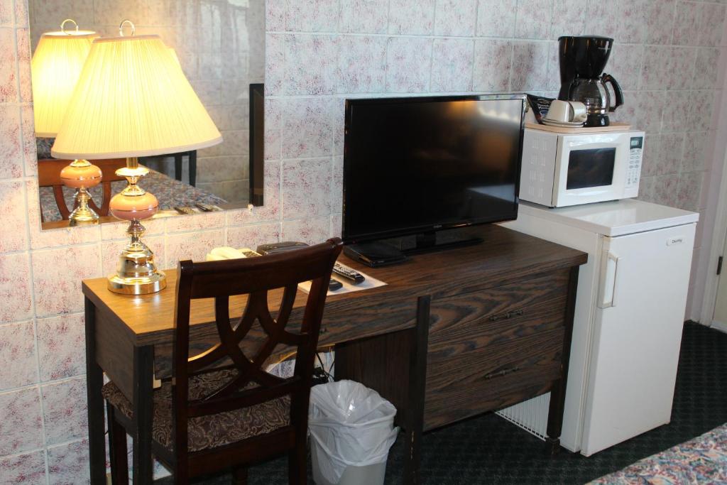 Kuchyň nebo kuchyňský kout v ubytování Best Continental Motel