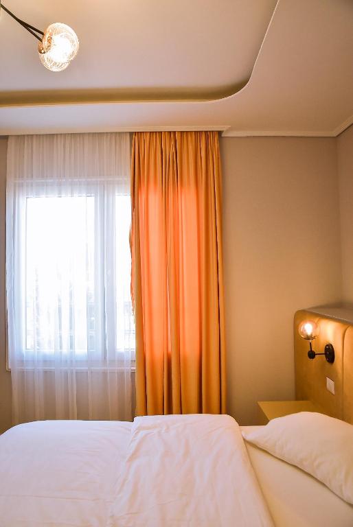 Letto o letti in una camera di Hotel Jurgen