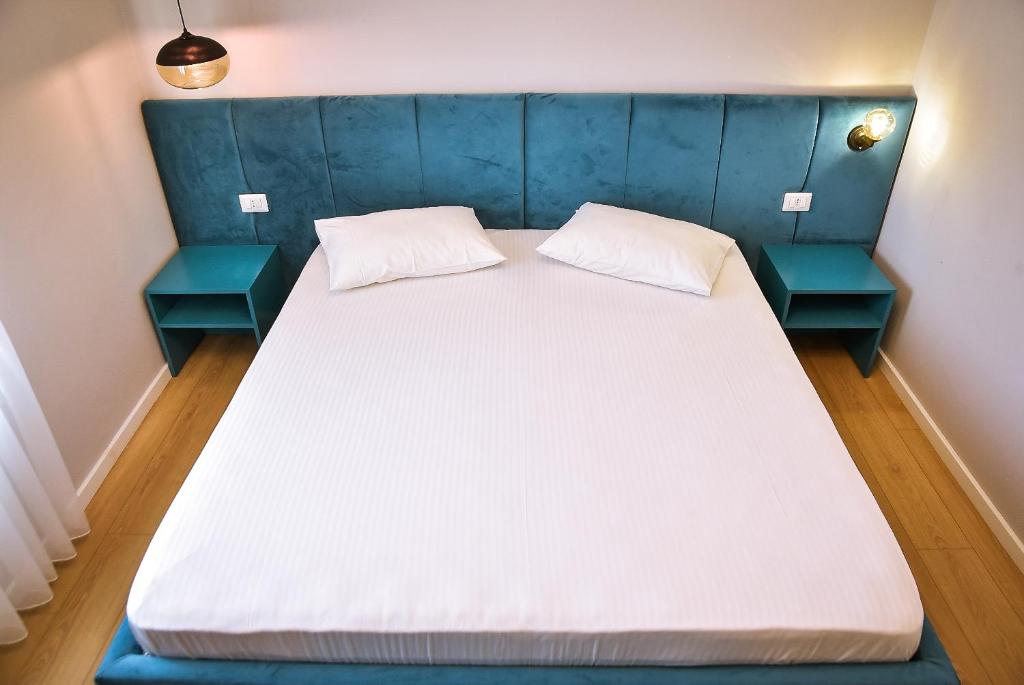 Letto o letti in una camera di Hotel Jurgen