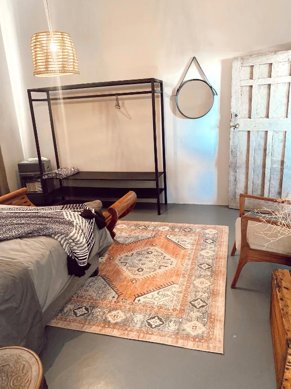 Postel nebo postele na pokoji v ubytování Britskraal Guest Farm