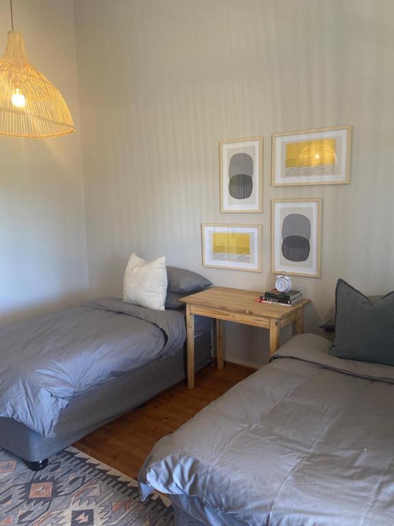 Postel nebo postele na pokoji v ubytování Britskraal Guest Farm