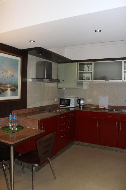 Kuchyň nebo kuchyňský kout v ubytování Herrmes Hospitality