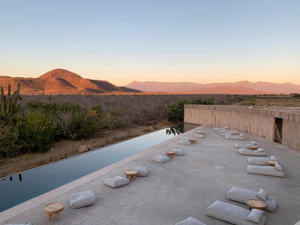 a resort with a pool in the middle of the desert at Paradero Todos Santos - Exclusive experiences included in Todos Santos