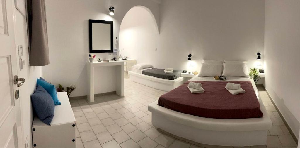 Łóżko lub łóżka w pokoju w obiekcie Sabbia Calda Apartments
