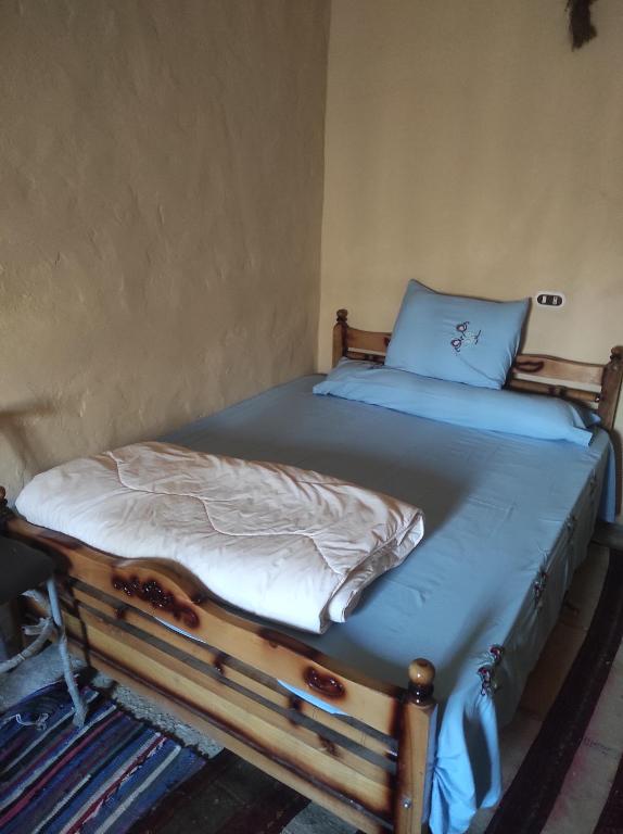 Postel nebo postele na pokoji v ubytování Olive Garden House Siwa
