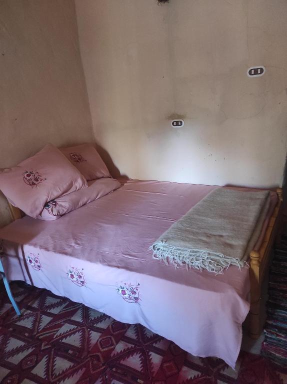 Postel nebo postele na pokoji v ubytování Olive Garden House Siwa