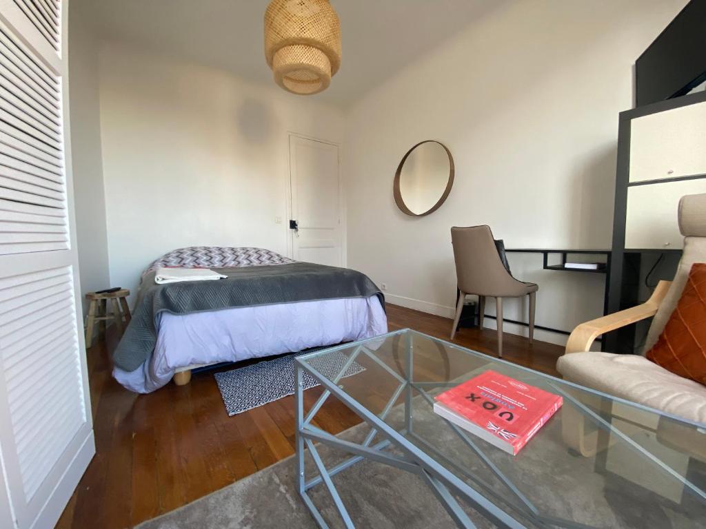 Postel nebo postele na pokoji v ubytování Chambre privative spacieuse proche de Paris centre et des sites Olympiques