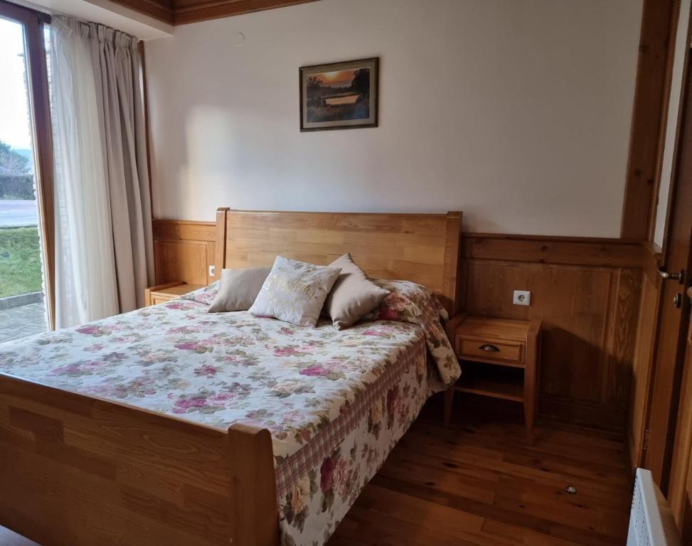 Postel nebo postele na pokoji v ubytování Pirin Golf Hotel Private Studios