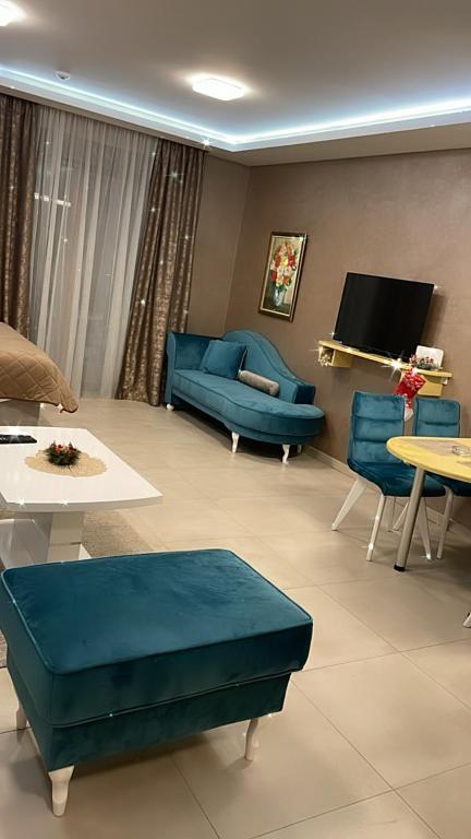 TV a/nebo společenská místnost v ubytování Apartmani Sofrenic-Hotel Adonis
