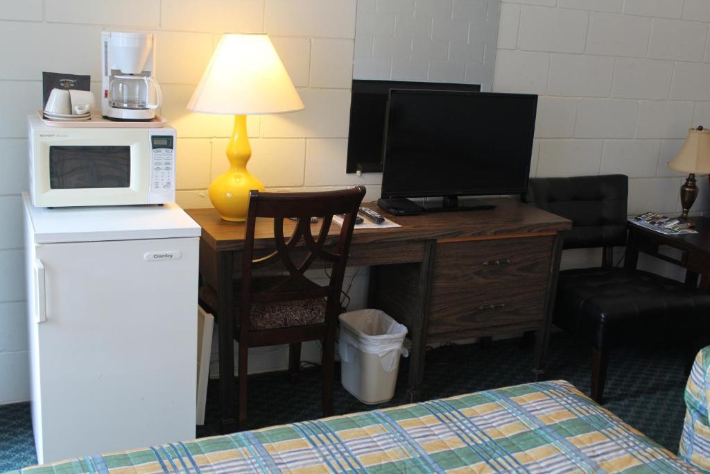 Kuchyň nebo kuchyňský kout v ubytování Best Continental Motel