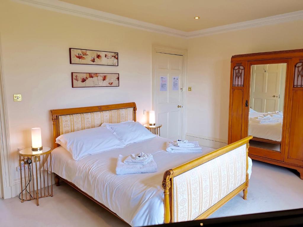 Postel nebo postele na pokoji v ubytování Bowden House B&B