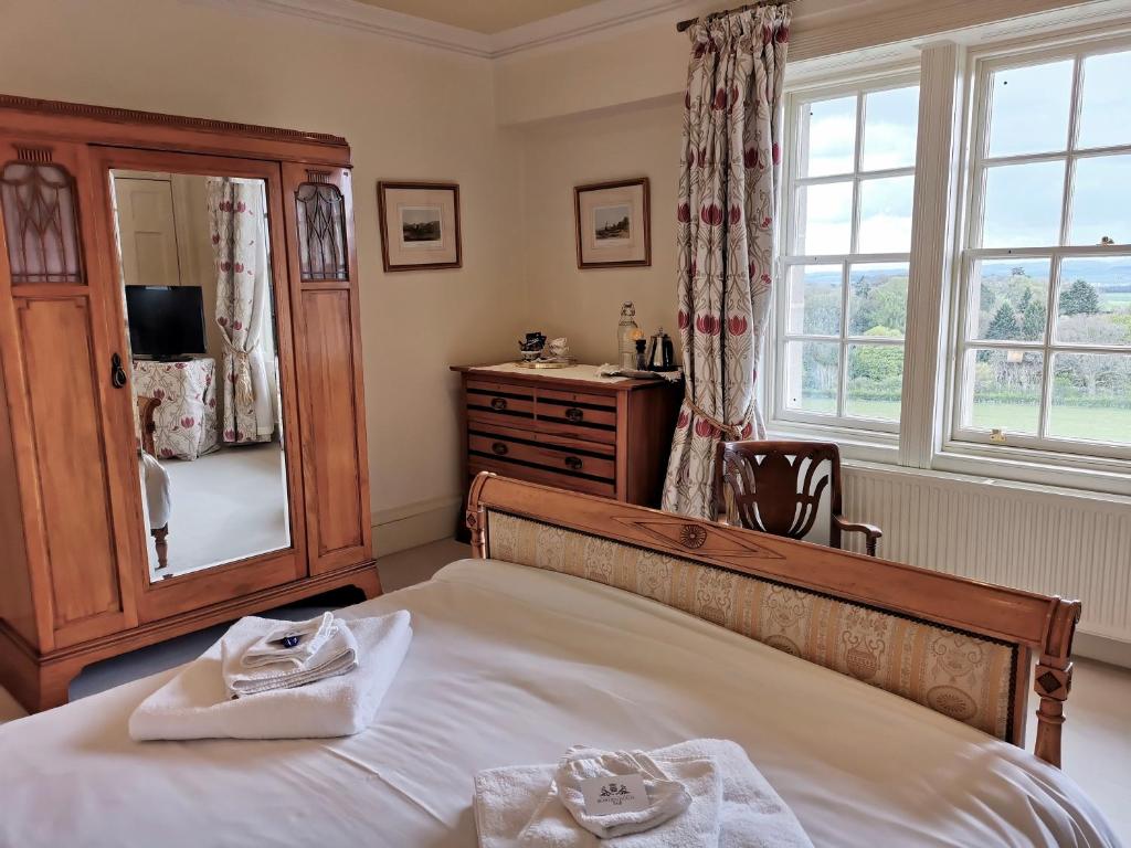 Postel nebo postele na pokoji v ubytování Bowden House B&B