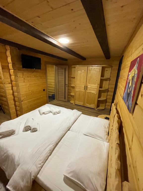 Postel nebo postele na pokoji v ubytování Vysche Neba