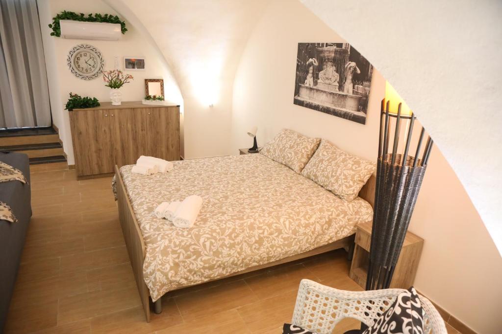 Posteľ alebo postele v izbe v ubytovaní Domus Ursino Comfort