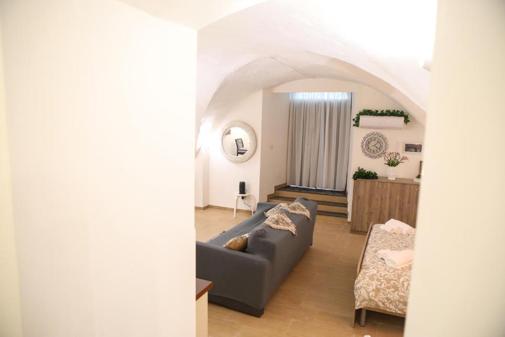 Posteľ alebo postele v izbe v ubytovaní Domus Ursino Comfort