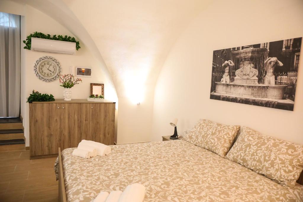 Posteľ alebo postele v izbe v ubytovaní Domus Ursino Comfort
