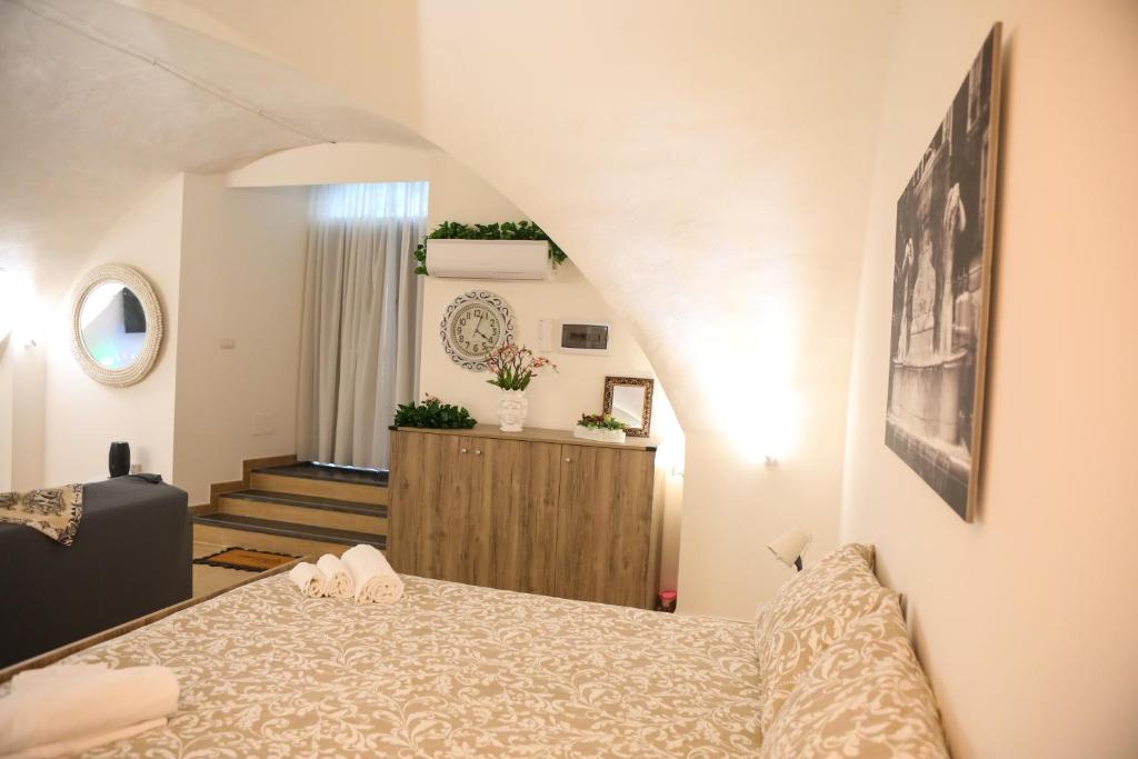 Posteľ alebo postele v izbe v ubytovaní Domus Ursino Comfort