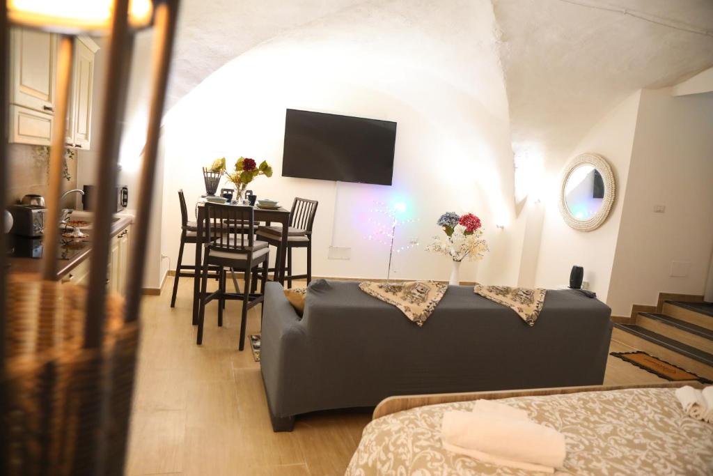 Televízia a/alebo spoločenská miestnosť v ubytovaní Domus Ursino Comfort
