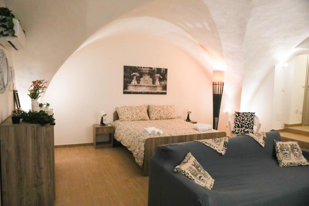Posteľ alebo postele v izbe v ubytovaní Domus Ursino Comfort