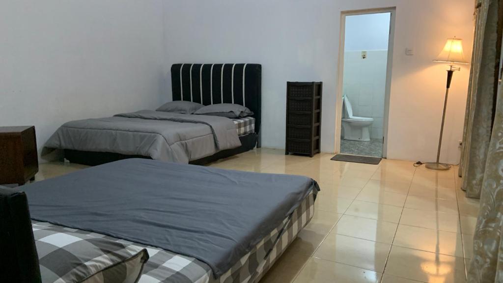 Postel nebo postele na pokoji v ubytování Villa Kay Mountain