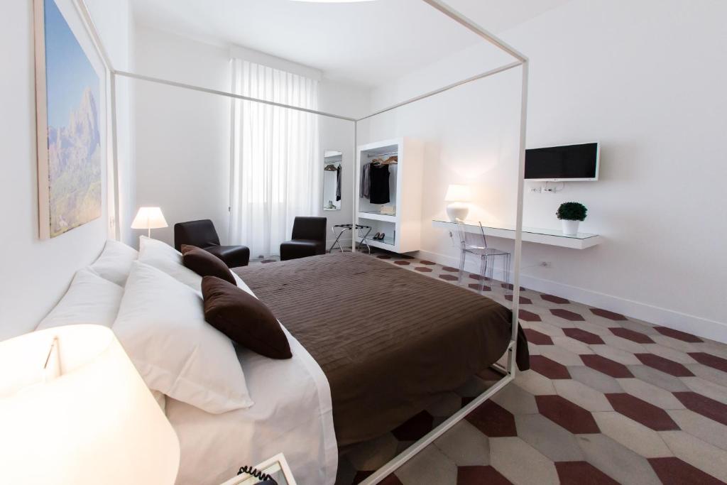 TV a/nebo společenská místnost v ubytování Rhegion B&B