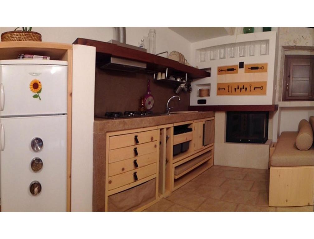 Cucina o angolo cottura di B&B Via dei Trulli