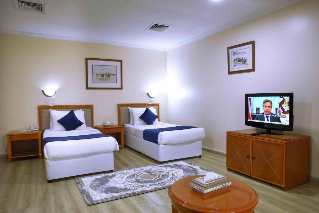 TV a/nebo společenská místnost v ubytování Al Seef Hotel