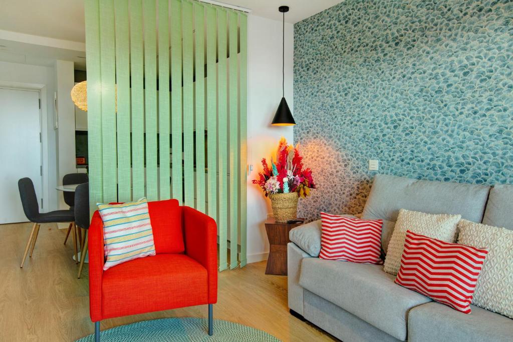 Posezení v ubytování La Casita del Muelle