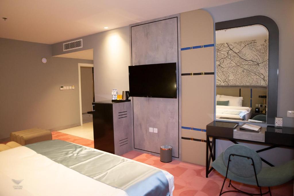 TV a/nebo společenská místnost v ubytování Skyline Tabuk Hotel